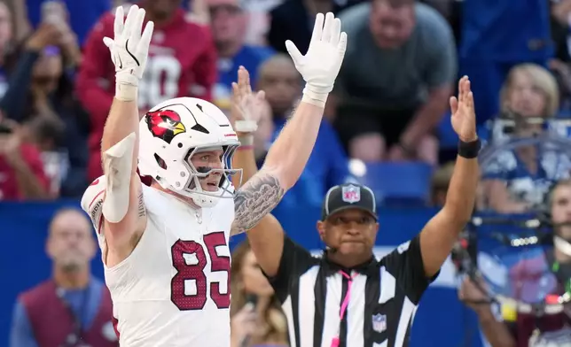 Arizona Cardinals' Trey McBride reacts after a touchdown during the second half of an NFL football game against the Indianapolis Colts Sunday, Oct. 12, 2025, in Indianapolis. (AP Photo/AJ Mast)