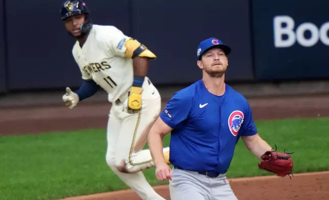 Chicago Cubs pitcher Matthew Boyd watches as Milwaukee Brewers' Jackson Chourio hits a two-run scoring single during the first inning of Game 1 of baseball's National League Division Series Saturday, Oct. 4, 2025, in Milwaukee. (AP Photo/Morry Gash)