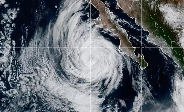 This NOAA satellite image taken at 2:09 p.m. EST on Thursday, Oct. 9, 2025, shows Tropical Storm Priscilla off the western coast of Mexico in the eastern Pacific Ocean. (NOAA via AP)