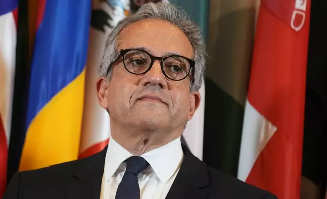 Egypt's Khaled El Enany attends a press conference after being elected Secretary-General by UNESCO executive board members, at the UNESCO headquarters in Paris, Monday, Oct. 6, 2025. (AP Photo/Thibault Camus)