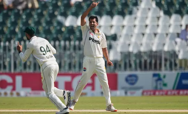 Pakistan's Asif Afridi celebrates after the dismissal of South Africa's Tristan Stubbs during the third day of the second test cricket match between Pakistan and South Africa, in Rawalpindi, Pakistan, Wednesday, Oct. 22, 2025. (AP Photo/Anjum Naveed)