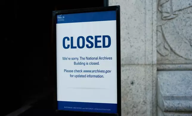 A closed sign stands in front of the National Archives on the first day of a government shutdown, Wednesday, Oct. 1, 2025, in Washington. (AP Photo/Julia Demaree Nikhinson)