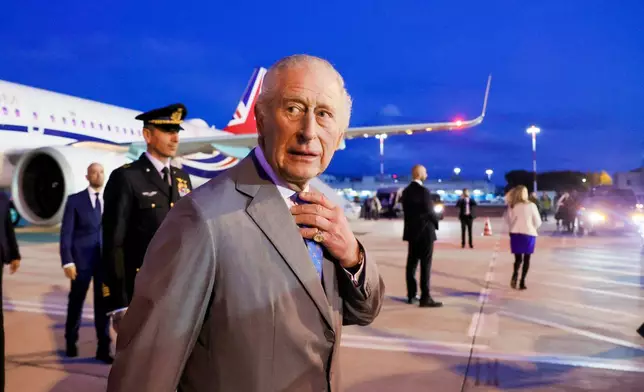 Britain's King Charles III arrives at Ciampino 31st Wing Airport in the outskirts of Rome, Wednesday, Oct. 22, 2025, a day before a state visit to the Vatican. (Cecilia Fabiano/ Lapresse via AP)