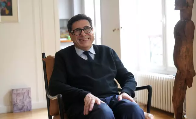 France's Philippe Aghion smiles before an interview with the Associated Press after winning the Nobel prize in economics Monday, Oct. 13, 2025 in Paris. (AP Photo/Thibault Camus)