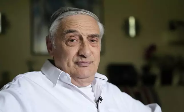 Joel Mokyr poses for a photo at his home, Monday, Oct. 13, 2025, in Skokie, Ill., after winning the Nobel prize in economics. (AP Photo/Nam Y. Huh)