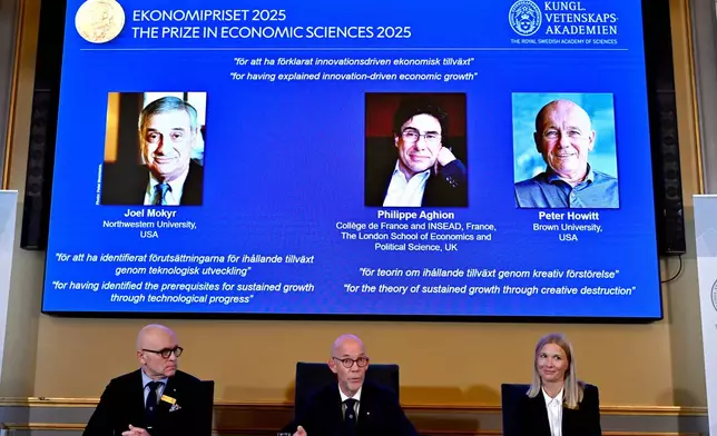 Professor John Hassler, from left, Hans Ellegren, Permanent Secretary of the Academy of Sciences and Professor Kerstin Enflo, announce Joel Mokyr, Philippe Aghion and Peter Howitt as the recipients of the Nobel Memorial Prize in Economics during a press conference at the Royal Swedish Academy of Sciences in Stockholm, Sweden, Monday, Oct. 13, 2025. (Anders Wiklund/TT News Agency via AP)