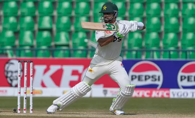 Pakistan's Babar Azam bats during the third day of the first test cricket match between Pakistan and South Africa, in Lahore, Pakistan, Tuesday, Oct. 14, 2025. (AP Photo/K.M. Chaudary)