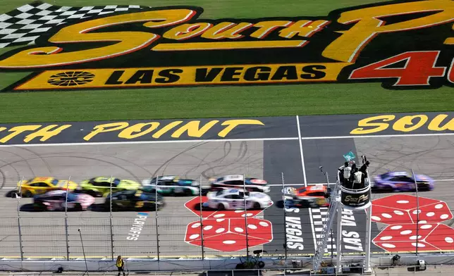 Drivers get the green flag at the start of a NASCAR Cup Series auto race Sunday, Oct. 12, 2025, in Las Vegas. (AP Photo/Steve Marcus)
