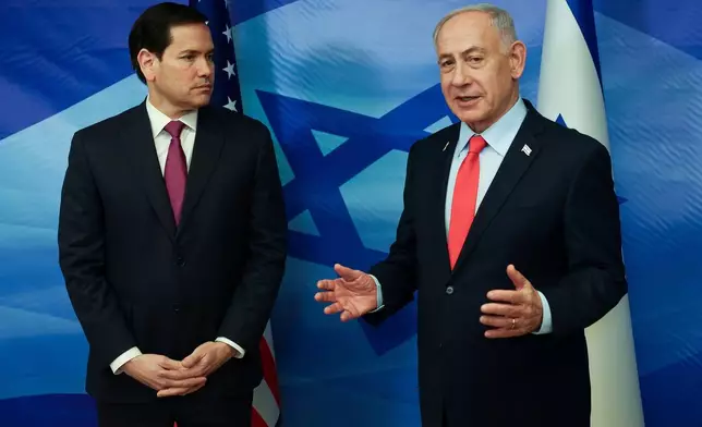 Israeli Prime Minister Benjamin Netanyahu speaks next to U.S. Secretary of State Marco Rubio at the Prime Minister's Office in Jerusalem, Thursday, Oct. 23, 2025. (Ronen Zvulun/Pool Photo via AP)