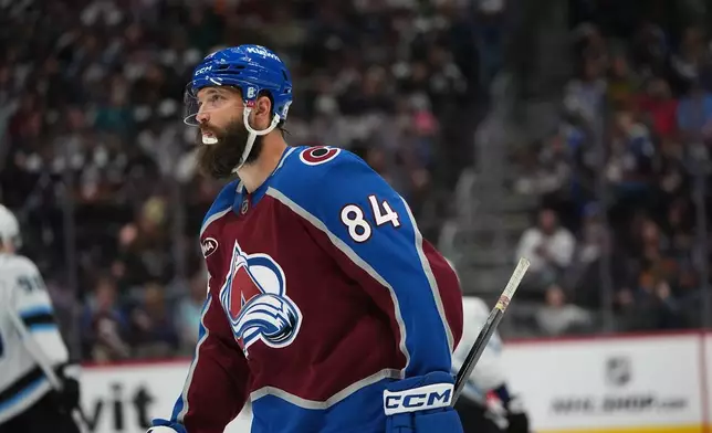 Colorado Avalanche defenseman Brent Burns waits for a face-off against the Utah Mammoth in the second period of an NHL hockey game Thursday, Oct. 9, 2025, in Denver. (AP Photo/David Zalubowski)