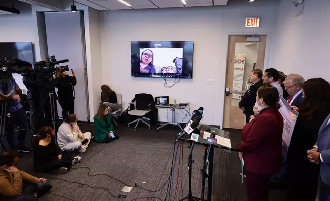 Sandibell Hidalgo, left, and Ofelia Torres, 16, speak to the room about the detention of Ruben Torres Maldonado during a press conference calling for the release of Ruben Torres Maldonado at 5233 W Diversey Ave, Wednesday, Oct. 22, 2025 in Chicago. (Anthony Vazquez /Chicago Sun-Times via AP)