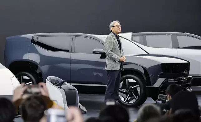 Honda Chief Executive Toshihiro Mibe speaks to the media at Tokyo Mobility Show during a media day at Tokyo Big Sight in Tokyo, on Wednesday, Oct. 29, 2025. (Daiki Katagiri/Kyodo News via AP)
