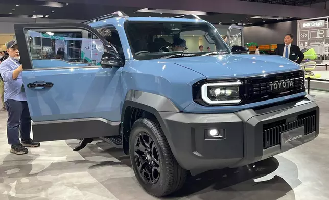 The new Toyota Land Cruiser is on display at the Tokyo Mobility Show, set to open to the public Thursday, at Tokyo Big Sight Wednesday, Oct. 29, 2025 in Tokyo. (AP Photo/Yuri Kageyama)