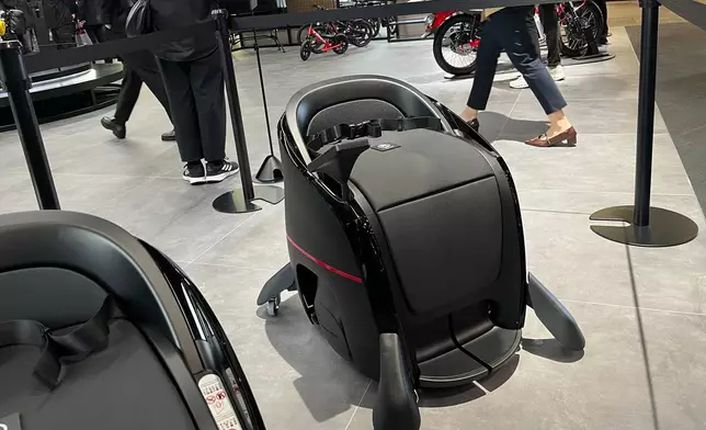 Honda's Uni-One, a kind of personal mobility for the future, is among the vehicles on display at the Tokyo Mobility Show, set to open to the public Thursday, on Wednesday, Oct. 29, 2025 at Tokyo Big Sight in Tokyo. (AP Photo/Yuri Kageyama)