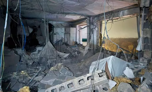 This photo released by Moscow Region Governor Andrei Vorobyev official telegram channel shows a view of the flat in the damaged multi-storey apartment building hit by a Ukrainian drone in Krasnogorsk, just outside Moscow, Russia, on Friday, Oct. 24, 2025. (Moscow Region Governor Andrei Vorobyev official telegram channel via AP)