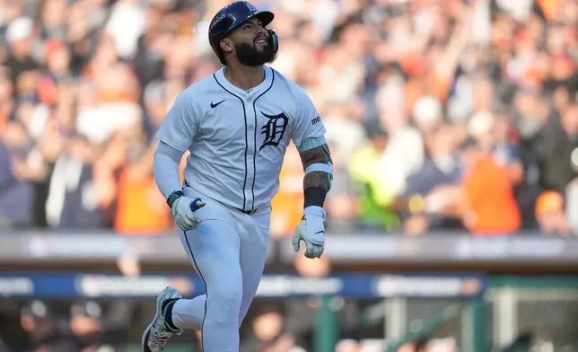 Detroit Tigers' Gleyber Torres watches his solo home run during the seventh inning in Game 4 of baseball's American League Division Series against the Seattle Mariners Wednesday, Oct. 8, 2025, in Detroit. (AP Photo/Paul Sancya)