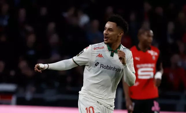 Nice's Sofiane Diop celebrates after scoring his side's first goal during the French League One soccer match between Rennes and Nice, Sunday Oct. 26, 2025 in Rennes, western France. (AP Photo/Jeremias Gonzalez)