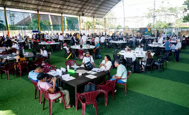 Participants attend an Amazon Water Summit in Iquitos, Peru, Oct. 1, 2025. (AP Photo/Junior Raborg)
