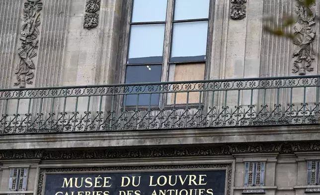 The window of Louvre museum where thieves arrive for the robbery, Monday, Oct. 20, 2025 in Paris. The museum remains closed for the day after Sunday's jewels robbery, (AP Photo/Emma Da Silva)