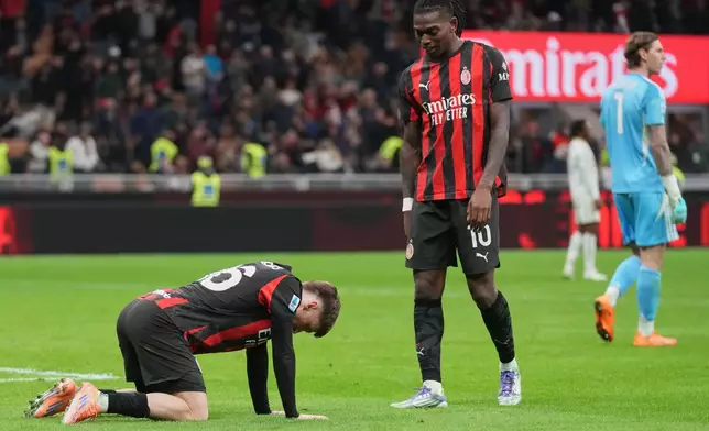 AC Milan's Alexis Saelemaekers reacts after a miss during the Serie A soccer match between AC Milan and Pisa in Milan, Italy, Friday, Oct. 24, 2025. (AP Photo/Antonio Calanni)