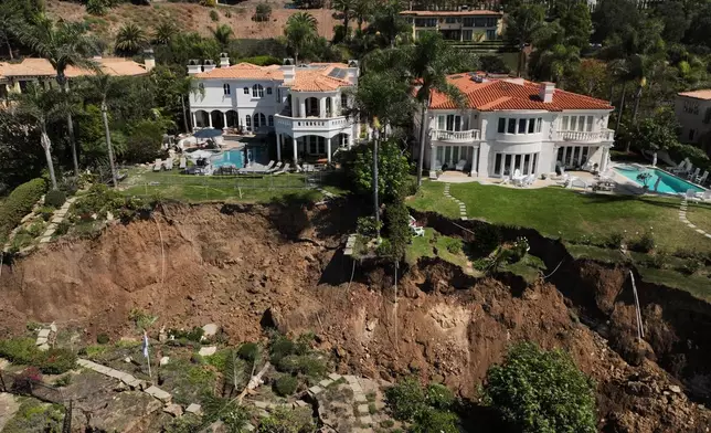 A landslide on a coastal bluff is shown from an aerial view on Tuesday, Sept. 30, 2025, in Rancho Palos Verdes, Calif. (AP Photo/Jae C. Hong)