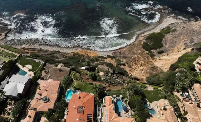 A landslide on a coastal bluff is shown from an aerial view on Tuesday, Sept. 30, 2025, in Rancho Palos Verdes, Calif. (AP Photo/Jae C. Hong)
