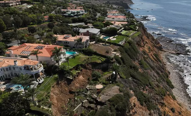 A landslide on a coastal bluff is shown from an aerial view on Tuesday, Sept. 30, 2025, in Rancho Palos Verdes, Calif. (AP Photo/Jae C. Hong)