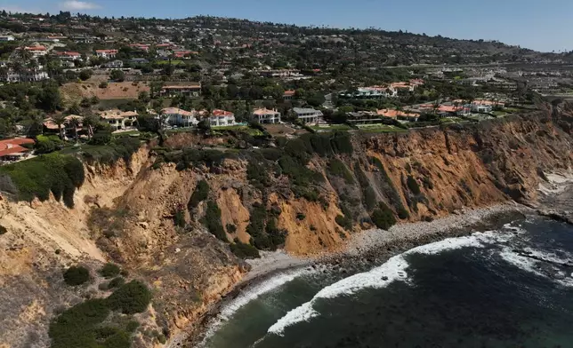A landslide on a coastal bluff is shown from an aerial view on Tuesday, Sept. 30, 2025, in Rancho Palos Verdes, Calif. (AP Photo/Jae C. Hong)