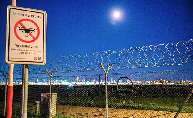 A sign prohibiting drones is seen at the Munich Airport on Friday, Oct. 3, 2025. (Enrique Kaczor/dpa via AP)