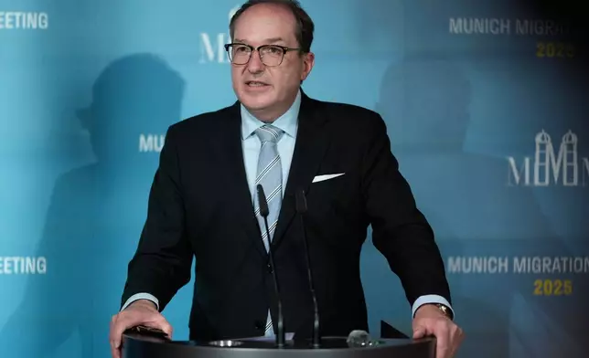 Germany's Minister of the Interior Alexander Dobrindt briefs the media after the 'Munich Migration Meeting' a European ministerial meeting on migration in Munich, Germany, Saturday, Oct. 4, 2025. (AP Photo/Matthias Schrader)