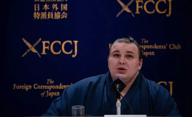 Ukrainian sumo wrestler Danilo Yavhushyshyn, known by his Japanese name Aonishiki Arata, speaks during a press conference at the Foreign Correspondents' Club of Japan, in Tokyo, Thursday, Oct. 9, 2025. (AP Photo/Louise Delmotte)
