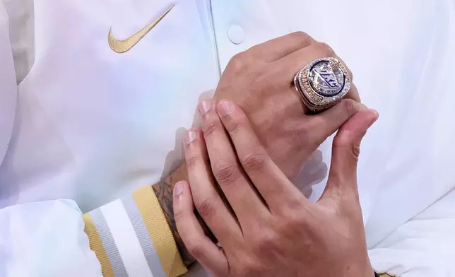 Oklahoma City Thunder forward Jaylin Williams wears his championship ring during a ceremony before an NBA basketball game against thee Houston Rockets, Tuesday, Oct. 21, 2025, in Oklahoma City. (AP Photo/Nate Billings)