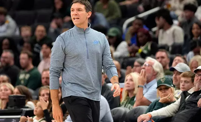 Oklahoma City Thunder Head Coach Mark Daigneault yells to his team during the second half of a preseason NBA basketball game against the Milwaukee Bucks Tuesday, Oct. 14, 2025, in Milwaukee. (AP Photo/Kayla Wolf)