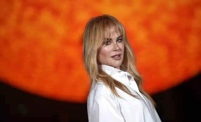 Nicole Kidman poses for photographers upon arrival at the Chanel Spring/Summer 2026 collection presented in Paris, Monday, Oct. 6, 2025. (AP Photo/Christophe Ena)