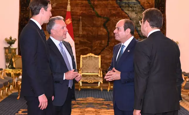 In this photo provided by Egypt's presidency media office, Egyptian President Abdel-Fattah el-Sissi, second right, meets with U.S. Special Envoy to the Middle East Steve Witkoff, second left, and Jared Kushner, left, at the Presidential Palace in Cairo, Egypt, Thursday, Oct. 9, 2025. (Egyptian Presidency Media Office via AP)