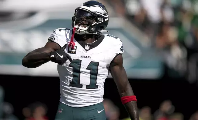 Philadelphia Eagles wide receiver A.J. Brown (11) celebrates after scoring during the second half of an NFL football game against the Los Angeles Rams Sunday, Sept. 21, 2025, in Philadelphia. (AP Photo/Matt Slocum)