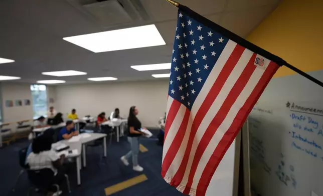 Immigrants trying to learn the English language participate in ESOL classes offered by Catholic Charities of Central Florida, Tuesday, Aug. 19, 2025, in Orlando, Fla. (AP Photo/Rebecca Blackwell)