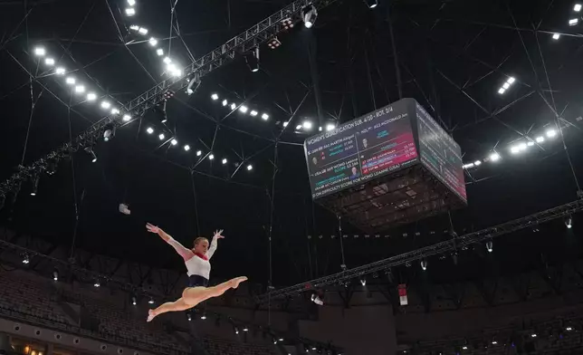 Dulcy Caylor of the United States competes on the balance beam during the 53rd Artistic Gymnastics World Championships in Jakarta, Indonesia, Tuesday, Oct. 21, 2025. (AP Photo/Dita Alangkara)