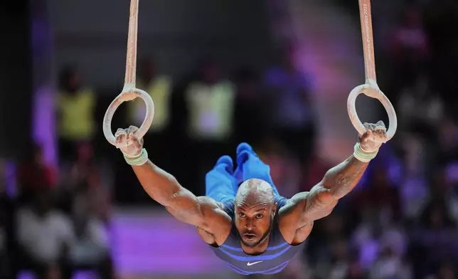 Donnell Whittenburg of the United States competes in the men's rings final during the 53rd Artistic Gymnastics World Championships in Jakarta, Indonesia, Friday, Oct. 24, 2025. (AP Photo/Achmad Ibrahim)