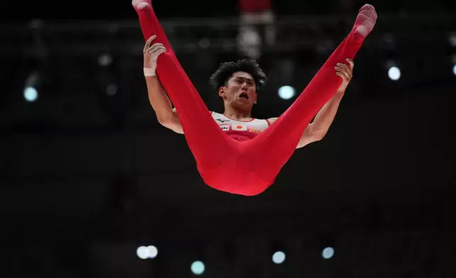 Daiki Hashimoto of Japan competes in the Men's All-Around Final during the 53rd Artistic Gymnastics World Championships in Jakarta, Indonesia, Wednesday, Oct. 22, 2025. (AP Photo/Dita Alangkara)