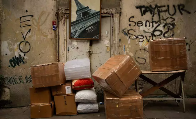 Boxes of goods are piled up in the Eminonu commercial area of Istanbul, Turkey, Thursday, Oct. 2, 2025. (AP Photo/Emrah Gurel)