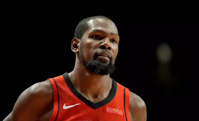 Houston Rockets forward Kevin Durant (7) moves on the court against the New Orleans Pelicans during the first half of an NBA preseason basketball game, Tuesday, Oct. 14, 2025, in Birmingham, Ala. (AP Photo/Mike Stewart)