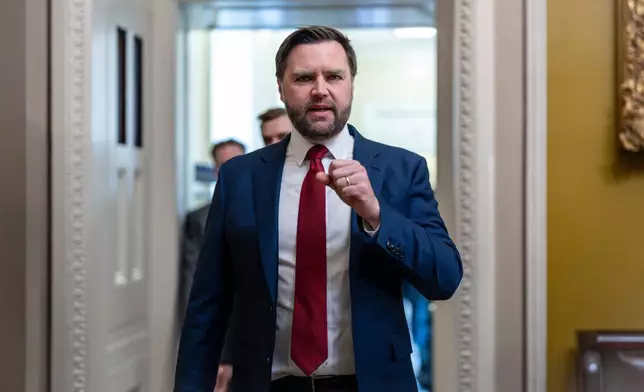 Vice President JD Vance arrives to speak with reporters after emerging from a closed-door meeting with Senate Republicans at the Capitol in Washington, Tuesday, Oct. 28, 2025. (AP Photo/J. Scott Applewhite)
