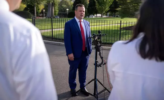 FILE - Director of the Federal Housing Finance Agency Bill Pulte speaks with reporters at the White House, Tuesday, Sept. 2, 2025, in Washington. (AP Photo/Mark Schiefelbein, File)