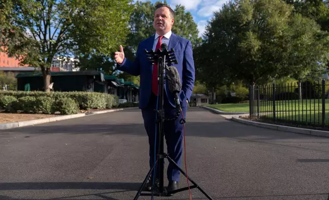 FILE - Director of the Federal Housing Finance Agency Bill Pulte speaks with reporters at the White House, Tuesday, Sept. 2, 2025, in Washington. (AP Photo/Mark Schiefelbein, File)