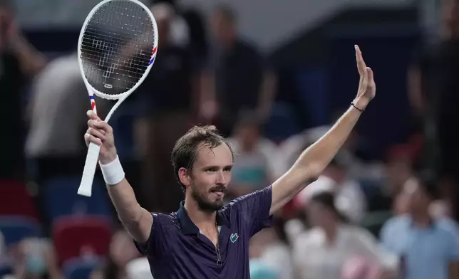 Daniil Medvedev of Russia celebrates after defeating Alex De Minaur of Australia in their men's singles quarterfinal match of the Shanghai Masters tennis tournament at Qizhong Forest Sports City Tennis Center, in Shanghai, China, Friday, Oct. 10, 2025. (AP Photo/Andy Wong)