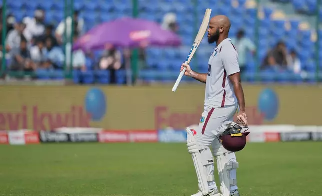 West Indies' John Campbell walks off the field after losing his wicket on the fourth day of the second cricket test match between India and West Indies at the Arun Jaitley Stadium in New Delhi, India, Monday, Oct.13, 2025. (AP Photo/Manish Swarup)