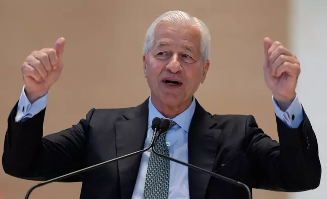 JPMorgan Chase CEO Jamie Dimon speaks during a ribbon cutting ceremony in New York, Tuesday, Oct. 21, 2025. (AP Photo/Seth Wenig)
