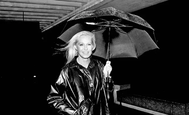 FILE - Joan Kennedy arrives for the premiere of a movie at the Museum of Science in Boston, Oct. 1, 1984. (AP Photo/Sean Kardon, file)