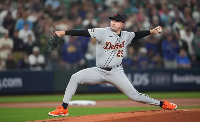 Detroit Tigers pitcher Tarik Skubal throws during the first inning in Game 5 of baseball's American League Division Series against the Seattle Mariners, Friday, Oct. 10, 2025, in Seattle. (AP Photo/Lindsey Wasson)
